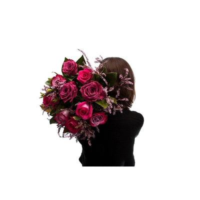Florist Choice - Sweet Cherry Rose Floral Bouquet. Styled with beautiful rich red and burgundy roses with luscious green foliage and leaves.   Available in 3 sizes in our deluxe vase or signature wrap.